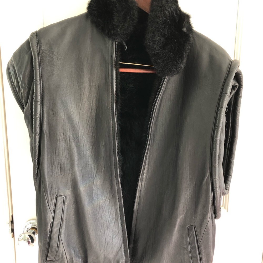 Fur and leather 80s style reversible coat vest with removable arms.